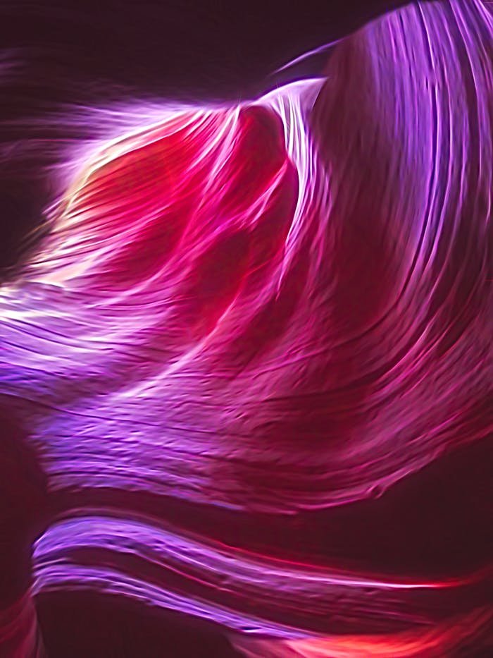 hero-img-02 Abstract image of vibrant flowing light trails in dynamic motion.
